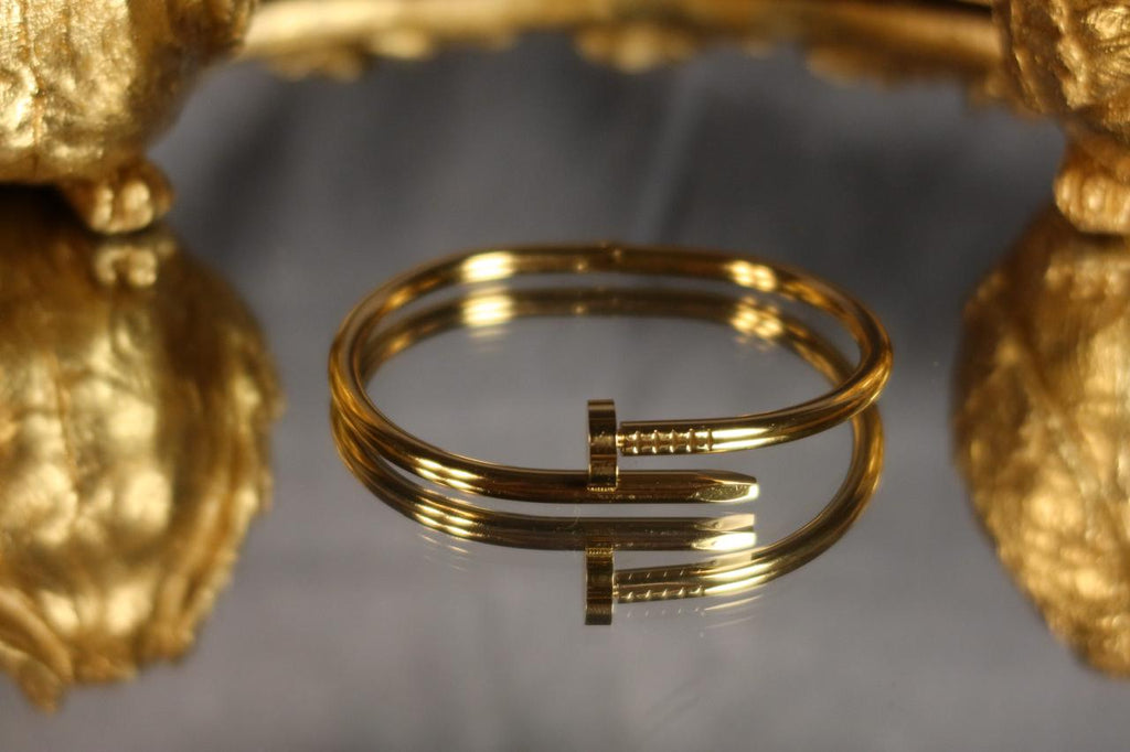 Nail Lock Handcuff – Elegant Gold Statement Handcuff for Women