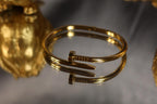 Nail Lock Handcuff – Elegant Gold Statement Handcuff for Women
