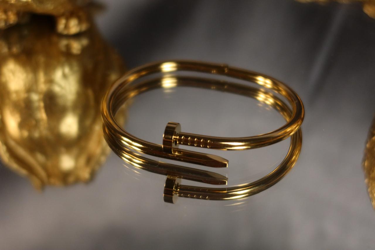 Nail Lock Handcuff – Elegant Gold Statement Handcuff for Women