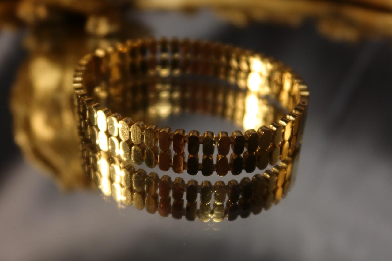 Golden Tile Chain Handcuff – Elegant Gold Statement Handcuff for Women