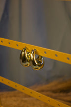 Golden Swirl Hoop Earrings – Elegant Gold Statement Earrings for Women